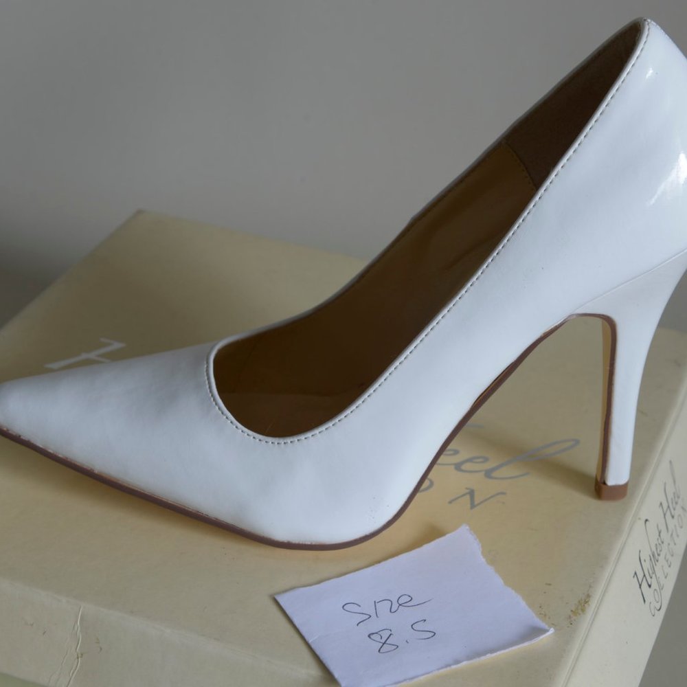 White 4" pumps by "highest heel"